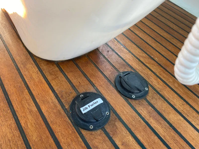 Slide: The Image of Jib furler controls on Jeanneau Sun Odyssey 54 DS teak deck, 2008 model. - 49