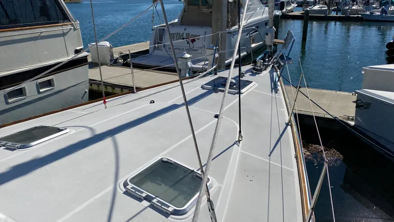 Slide: The Image of 2008 Jeanneau Sun Odyssey 54 DS sailboat docked at a marina. - 9