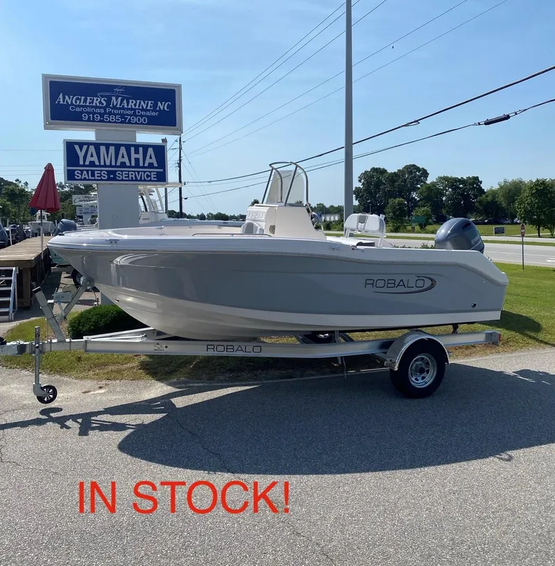 The Image of 2025 Robalo R180 Center Console boat on trailer, available at Angler's Marine. - 1
