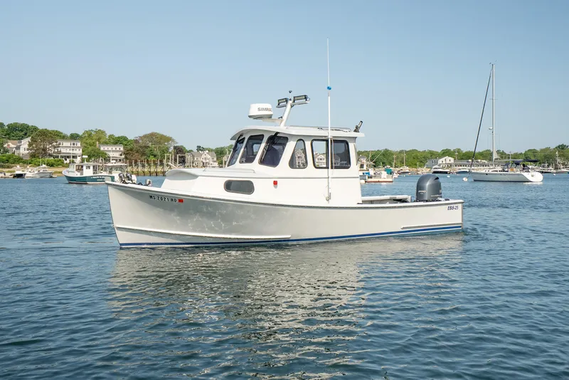 The Image of 2021 Beal Calvin Beal 25 Custom boat on calm water, with scenic background. - 1