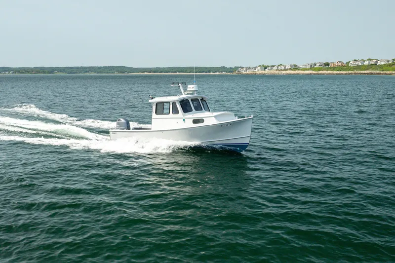 Slide: The Image of 2021 Beal Calvin Beal 25 Custom boat cruising on open water. - 7