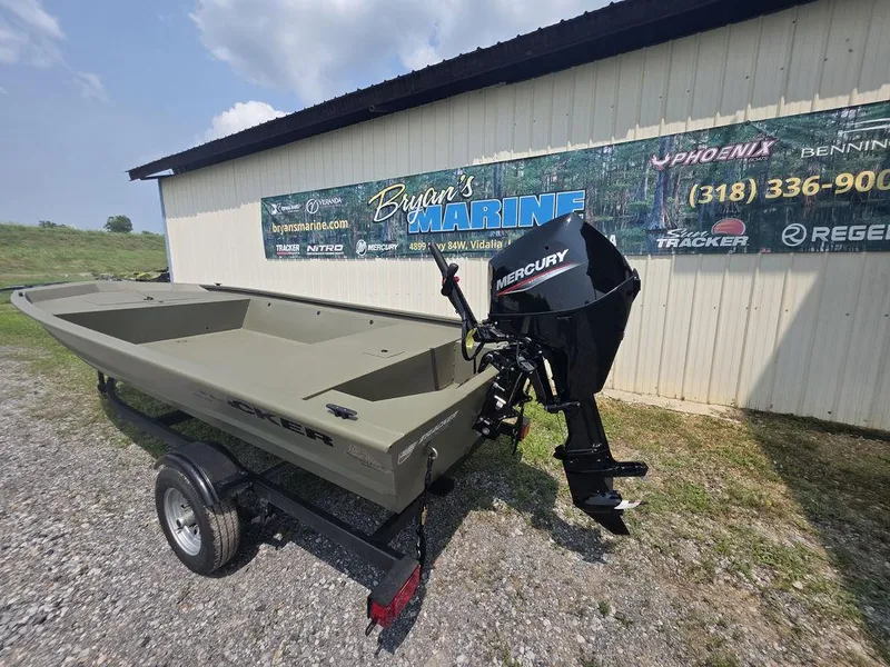Slide: The Image of 2025 Tracker Grizzly 1648 Utility boat with Mercury engine on trailer outside marine shop. - 11