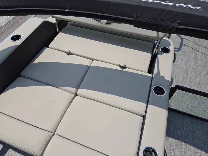 Slide: The Image of 2023 Barletta Cabrio 24UE boat seating with cup holders and sunshade. - 19