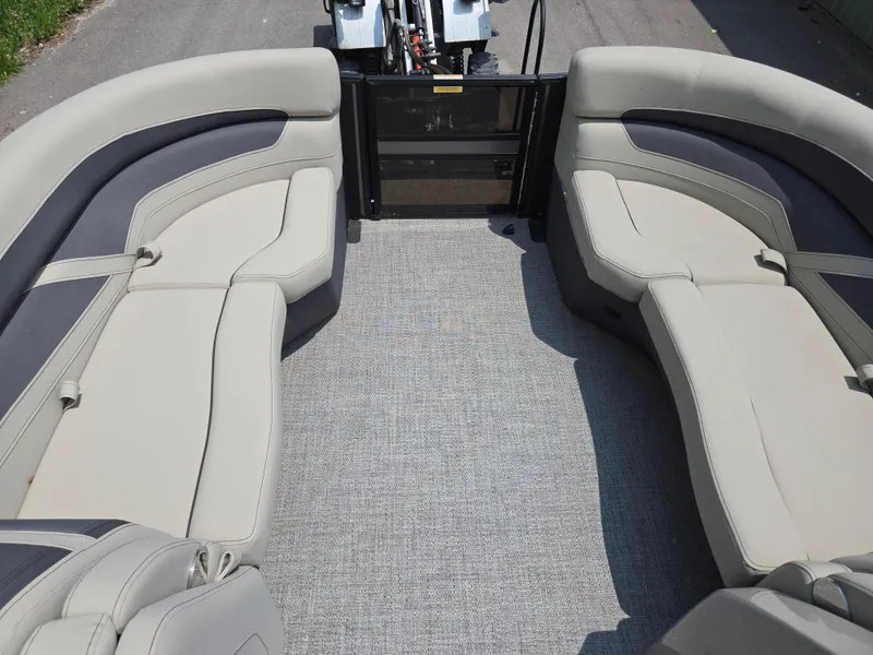 Slide: The Image of 2023 Barletta Cabrio 24UE boat interior with spacious seating and modern design. - 29
