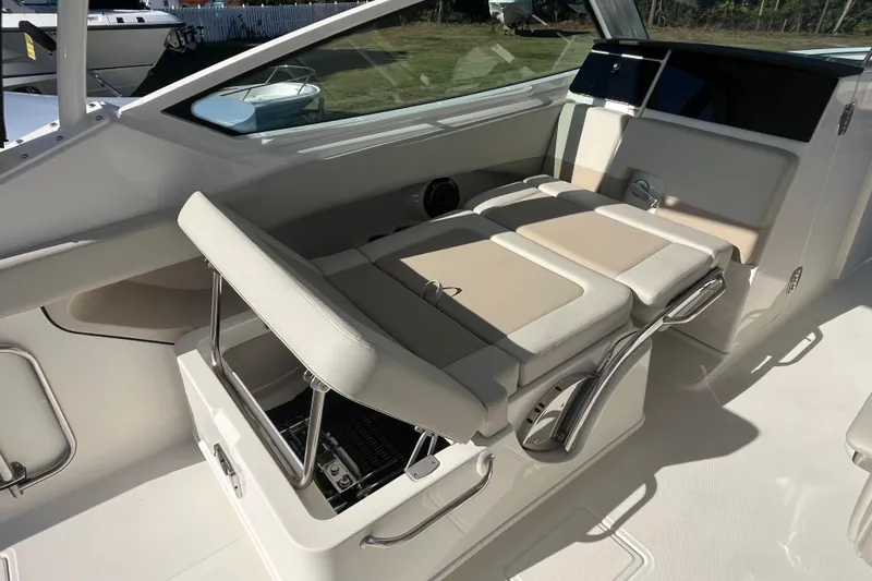 Slide: The Image of 2026 Boston Whaler 280 Vantage interior seating with adjustable backrest and modern design. - 21