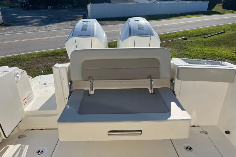 Slide: The Image of 2026 Boston Whaler 280 Vantage boat with dual Mercury engines and foldable seating. - 31
