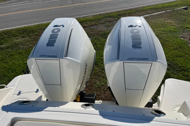 Slide: The Image of Twin Mercury outboard engines on a 2026 Boston Whaler 280 Vantage boat. - 35
