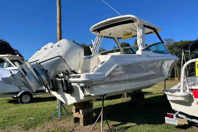 Slide: The Image of 2026 Boston Whaler 280 Vantage boat for sale, displayed on stands outdoors. - 40