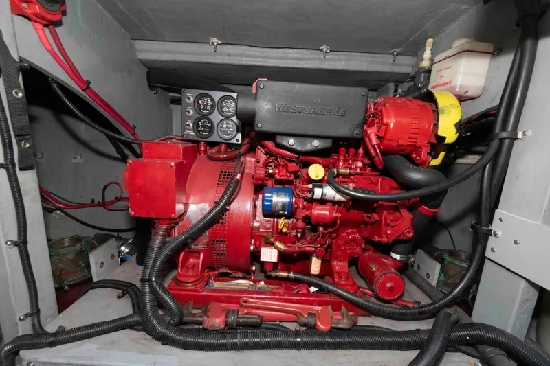 Slide: The Image of Engine compartment of a 1998 Sea Ray 450 Sundancer with Westerbeke generator. - 23
