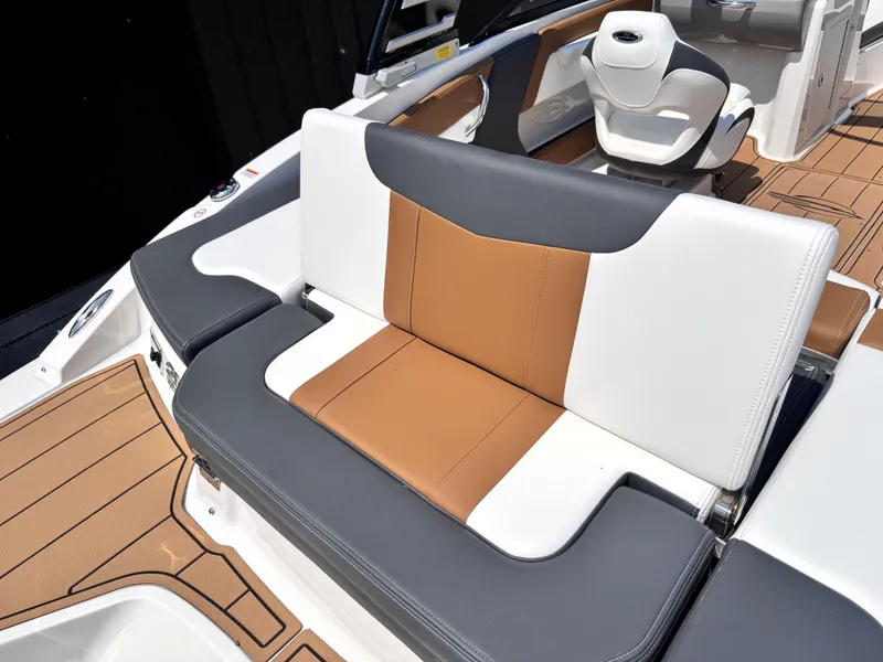 Slide: The Image of 2025 Chaparral 21 SSi OB boat interior with stylish seating and modern design. - 7
