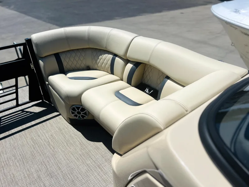 Slide: The Image of Close-up of Starcraft logo on 2026 RX 23 R DC boat interior. - 10