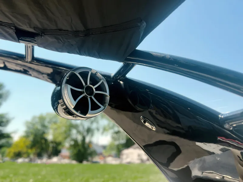 Slide: The Image of Dashboard of 2026 Starcraft RX 23 R DC boat with gauges and logo. - 16