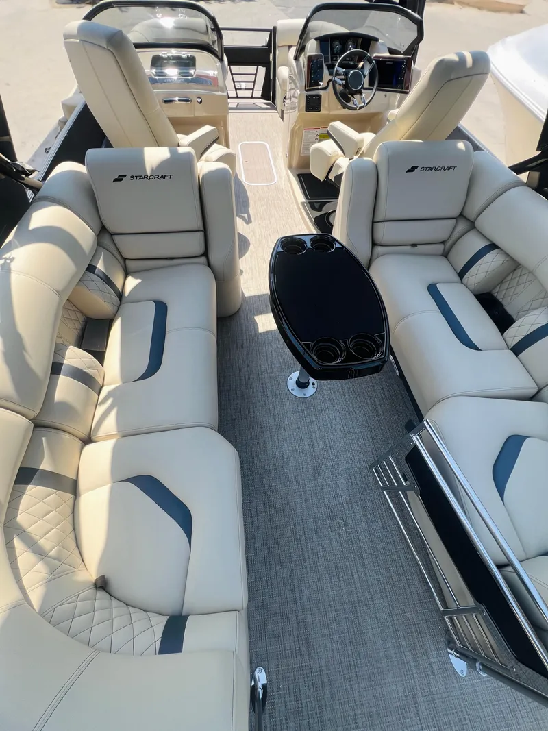 Slide: The Image of 2026 Starcraft RX 23 R DC boat with a foldable boarding ladder. - 5