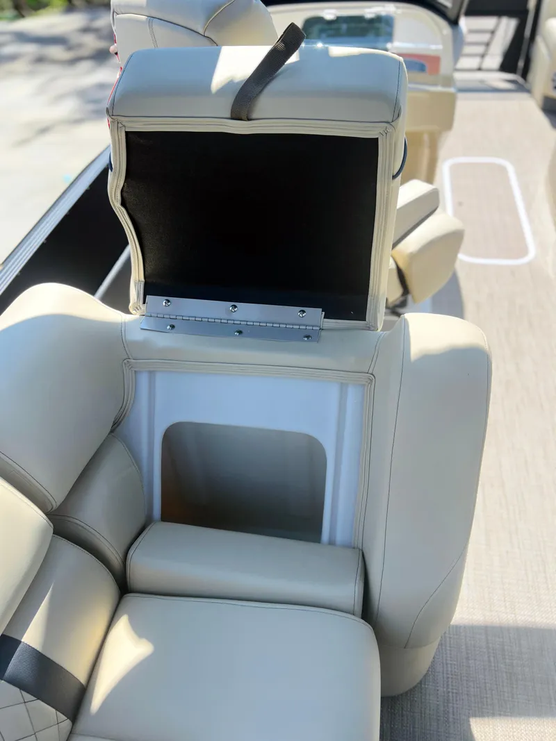 Slide: The Image of Luxurious beige and black leather interior of 2026 Starcraft RX 23 R DC boat. - 9