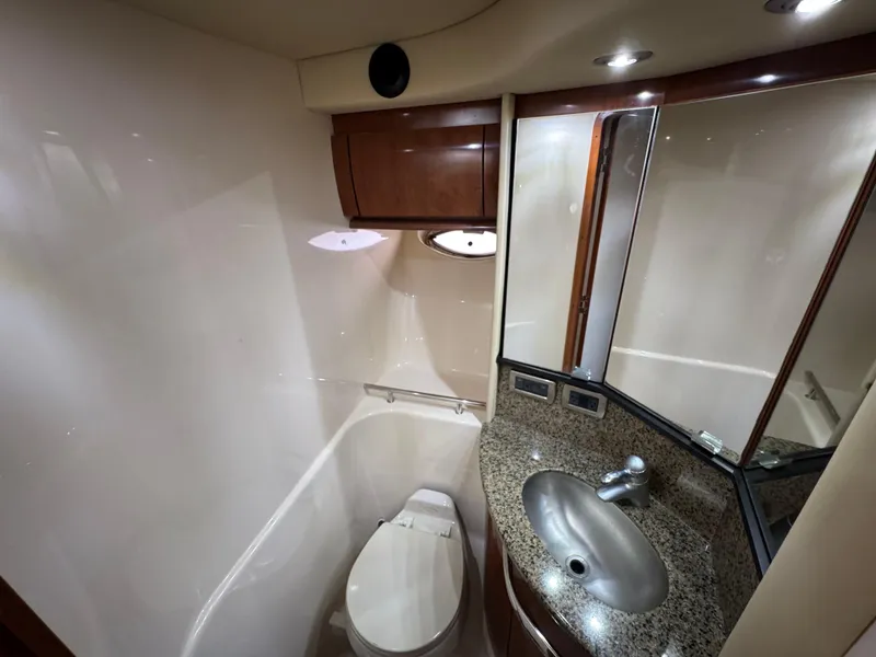 Slide: The Image of Luxurious bathroom in 2005 Sea Ray 420 Sundancer yacht with granite countertop and modern fixtures. - 35