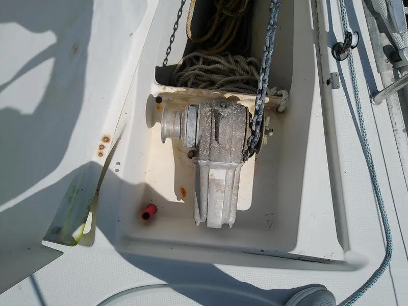 Slide: The Image of Anchor windlass on 1995 Beneteau First 42s7 sailboat deck. - 10
