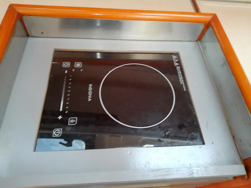 Slide: The Image of Induction cooktop on a 1995 Beneteau First 42s7 yacht kitchen. - 41