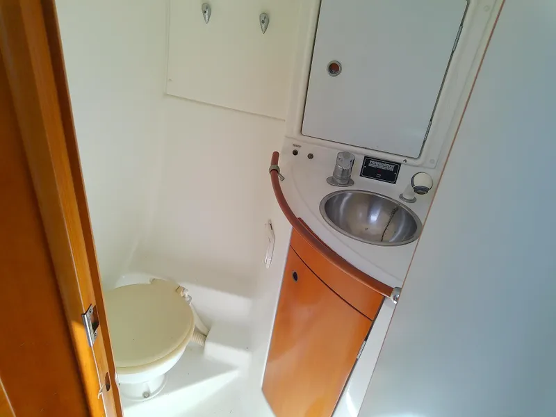 Slide: The Image of 1995 Beneteau First 42s7 yacht bathroom with sink and toilet. - 48