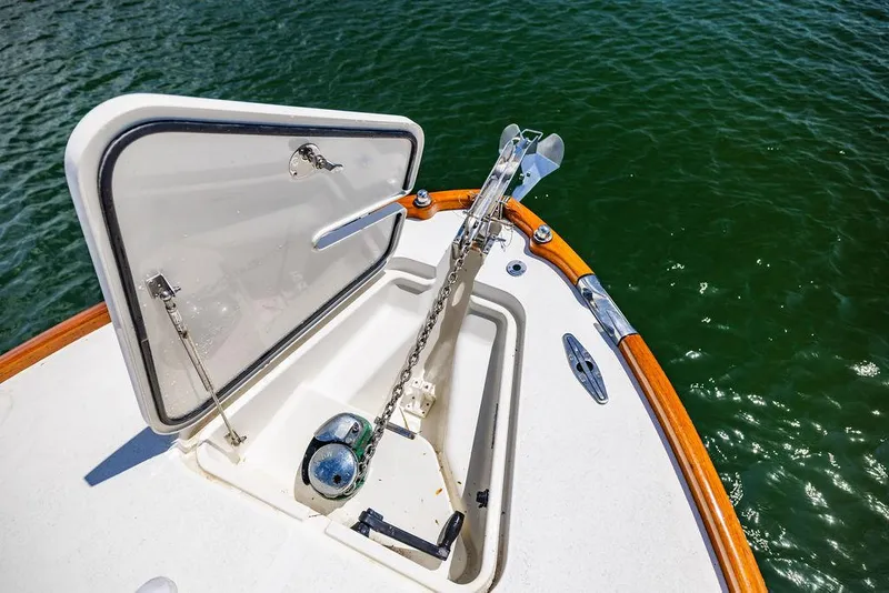 Slide: The Image of Bow of 2004 Hinckley Talaria 29 R with anchor and open hatch. - 9