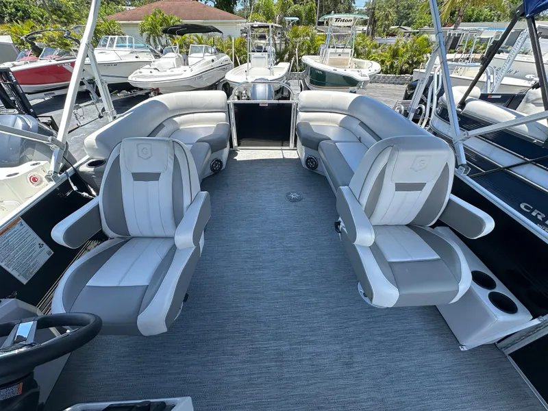 Slide: The Image of 2022 Godfrey Sweetwater 2286 FS pontoon boat with spacious seating and modern design. - 12