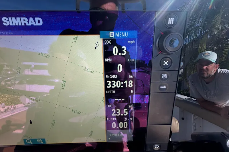 Slide: The Image of Simrad navigation display on 2017 Sportsman Heritage 231 Center Console boat. - 19