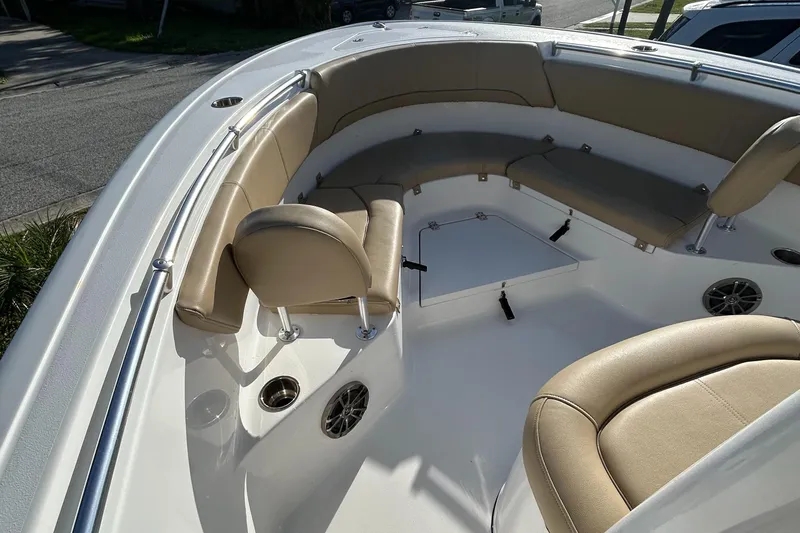 Slide: The Image of 2017 Sportsman Heritage 231 Center Console boat with tan seating and spacious deck. - 22