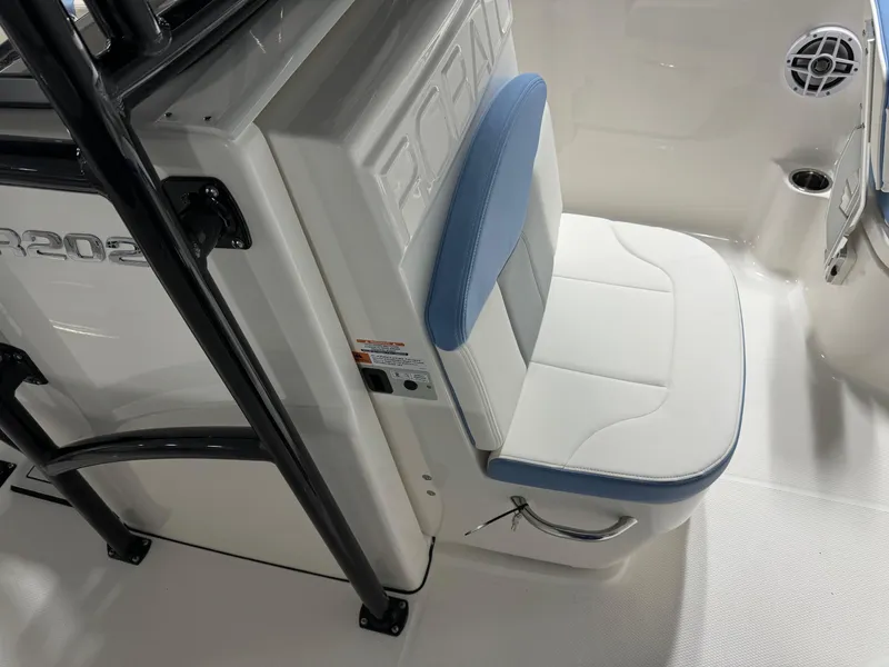 Slide: The Image of 2025 Robalo R202 Explorer boat seat with blue and white upholstery. - 7