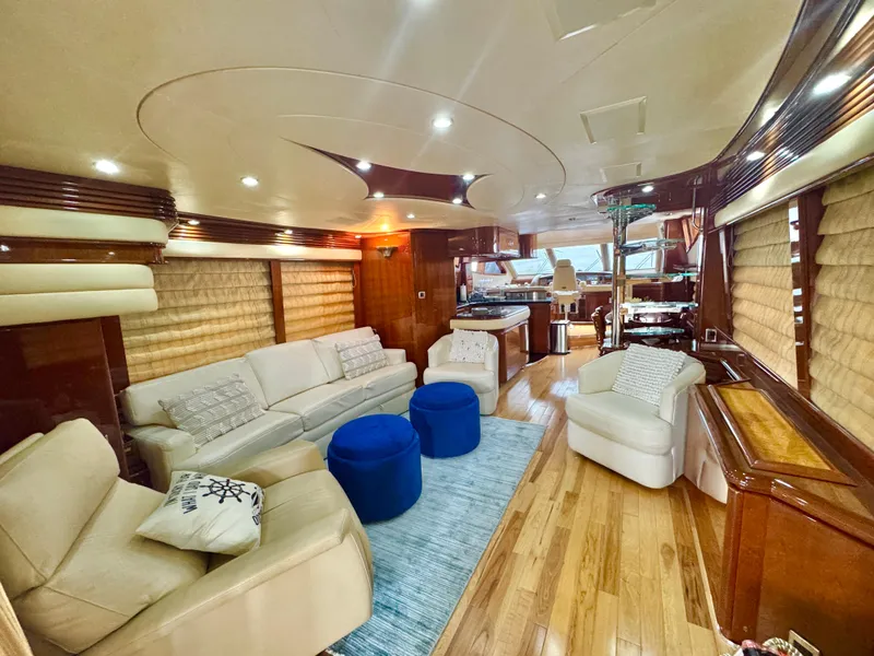 Slide: The Image of Luxurious interior of a 2006 Marquis 65 yacht with elegant seating and modern decor. - 19