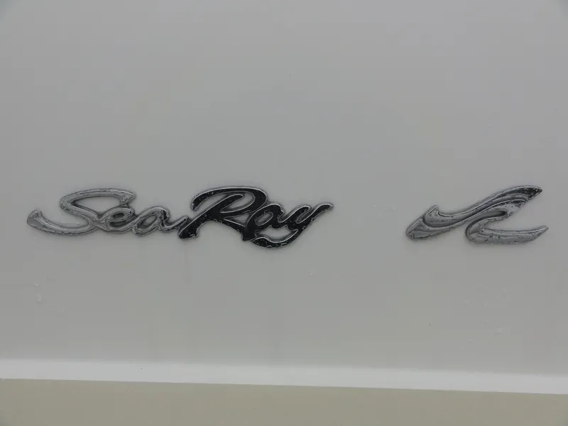 Slide: The Image of 1997 Sea Ray 330 Express logo on white background. - 6