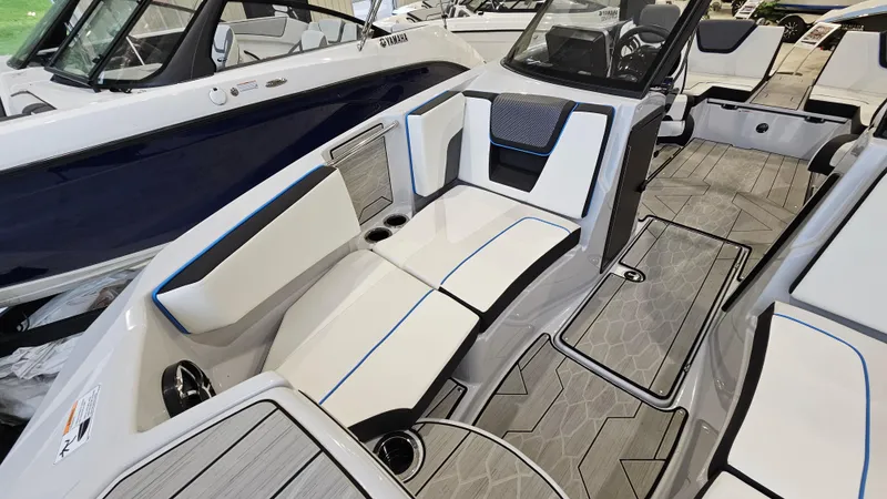 Slide: The Image of 2023 Yamaha Boats 222XD interior with sleek seating and modern design. - 19