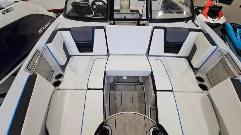 Slide: The Image of 2023 Yamaha Boats 222XD interior with spacious seating and modern design. - 21