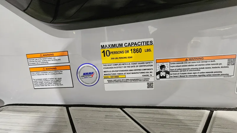 Slide: The Image of 2023 Yamaha Boats 222XD capacity label, maximum 10 persons or 1860 lbs, safety warnings visible. - 29