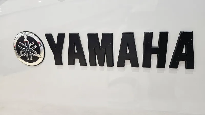 Slide: The Image of Yamaha logo on 2023 Yamaha Boats 222XD model. - 31