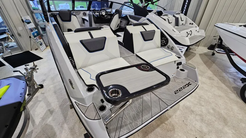 Slide: The Image of 2023 Yamaha Boats 222XD interior with sleek seating and modern design. - 5