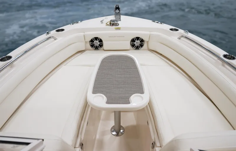 Slide: The Image of 2025 Grady-White 235 Freedom boat interior with seating and table. - 16