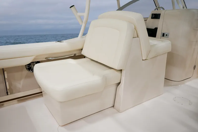 Slide: The Image of 2025 Grady-White 235 Freedom boat interior with comfortable seating. - 20