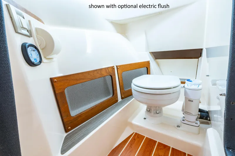 Slide: The Image of 2025 Grady-White 235 Freedom boat interior with optional electric flush toilet. - 5