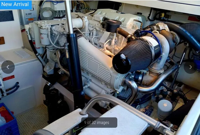 Slide: The Image of Engine room of a 2005 Cabo 35 Express boat, showcasing detailed machinery and components. - 4
