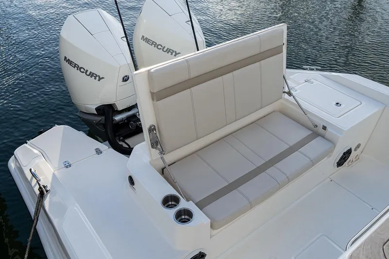 Slide: The Image of 2026 Boston Whaler 280 Dauntless helm with dual Simrad displays and modern controls. - 5