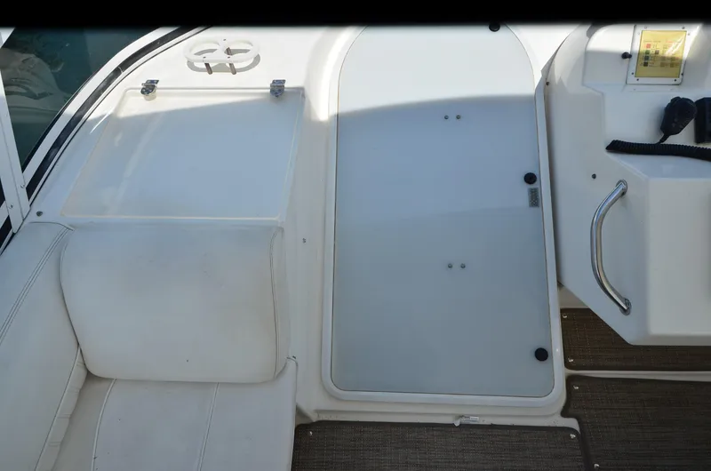 Slide: The Image of 2003 Cruisers Yachts 5000 Sedan Sport interior with seating and control panel. - 23