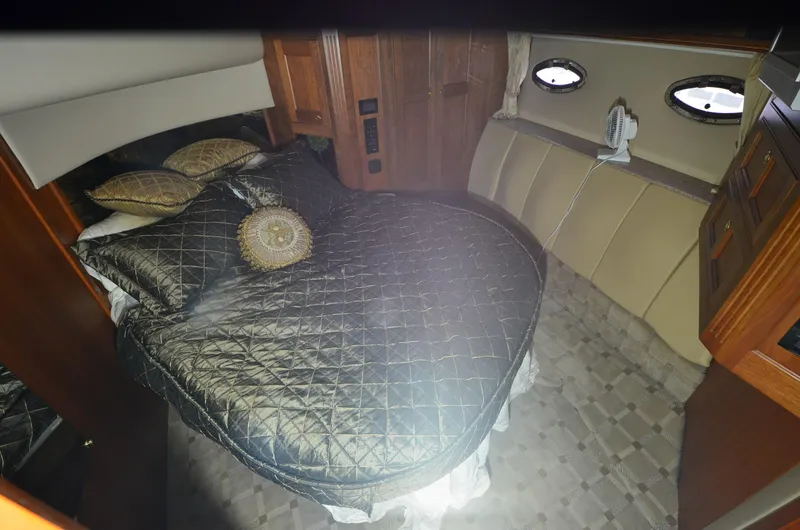 Slide: The Image of Luxurious bedroom interior of 2003 Cruisers Yachts 5000 Sedan Sport. - 59