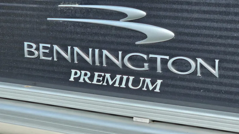 Slide: The Image of 2020 Bennington SX 23 Premium Swingback logo on boat exterior. - 22