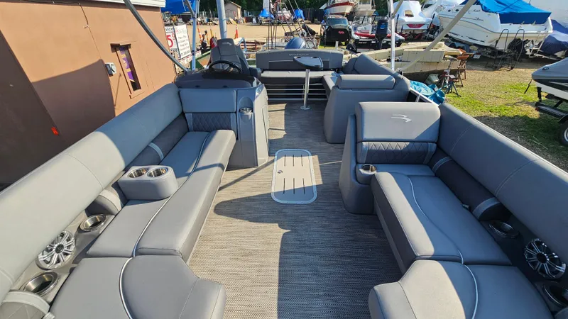 Slide: The Image of 2020 Bennington SX 23 Premium Swingback pontoon boat with spacious seating and modern design. - 8