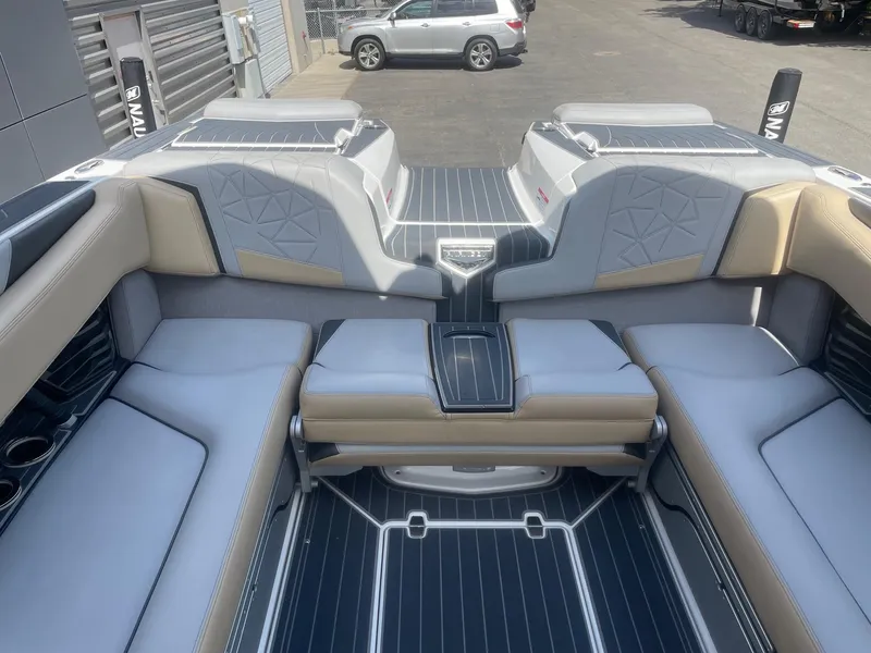 Slide: The Image of 2021 Nautique Super Air Nautique G25 Paragon interior with luxurious seating and modern design. - 8