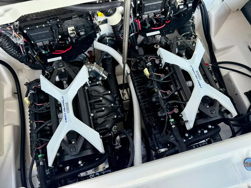 Slide: The Image of Twin engines of a 2025 Yamaha Boats 252SD, showcasing advanced marine engineering. - 13