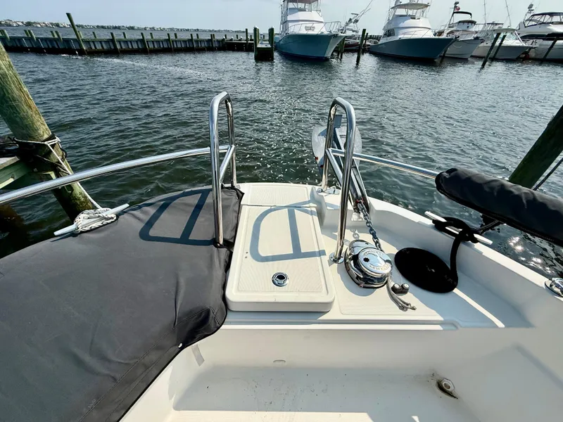 Slide: The Image of 2020 Jeanneau NC Sport 895 boat deck with railing, docked at marina. - 18