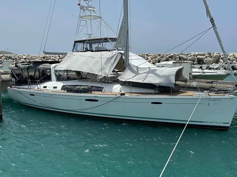 The Image of 2014 Beneteau Oceanis 50 sailboat docked in turquoise waters. - 0