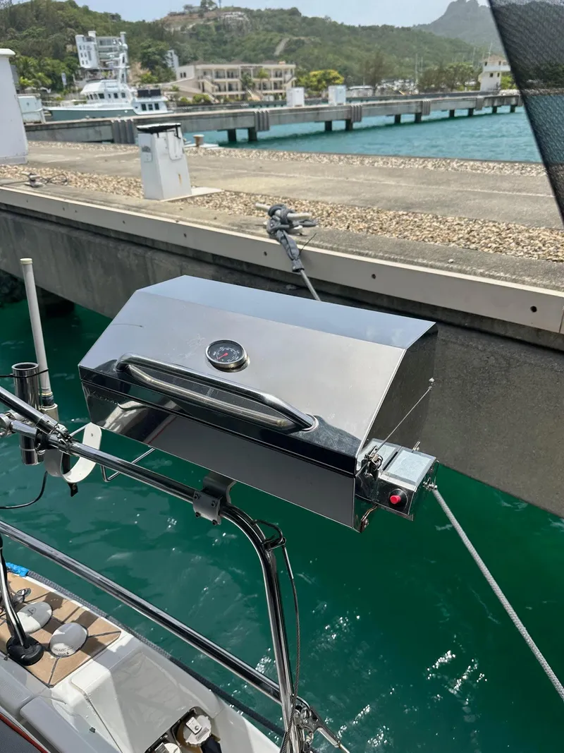 Slide: The Image of Stainless steel grill on a 2014 Beneteau Oceanis 50 yacht docked at a marina. - 14