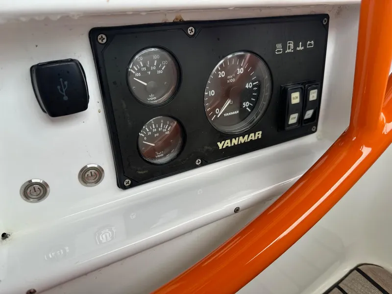 Slide: The Image of Control panel of a 2014 Beneteau Oceanis 50 sailboat with Yanmar engine gauges. - 17