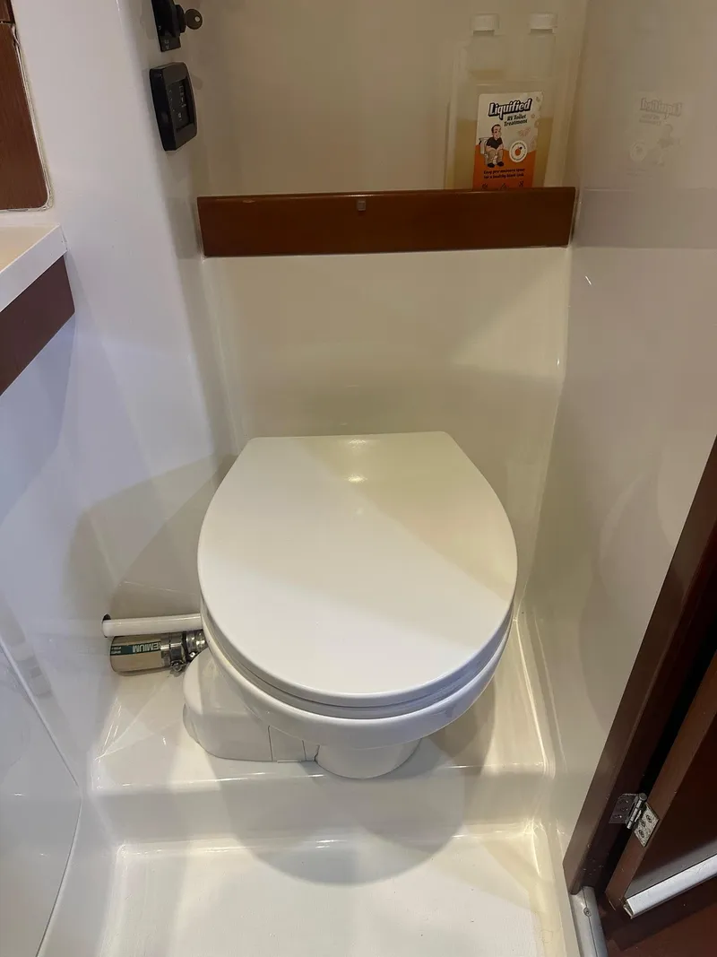 Slide: The Image of Beneteau Oceanis 50 yacht bathroom with modern toilet, 2014 model. - 35